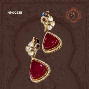 Peacock-inspired ruby and diamond statement earring